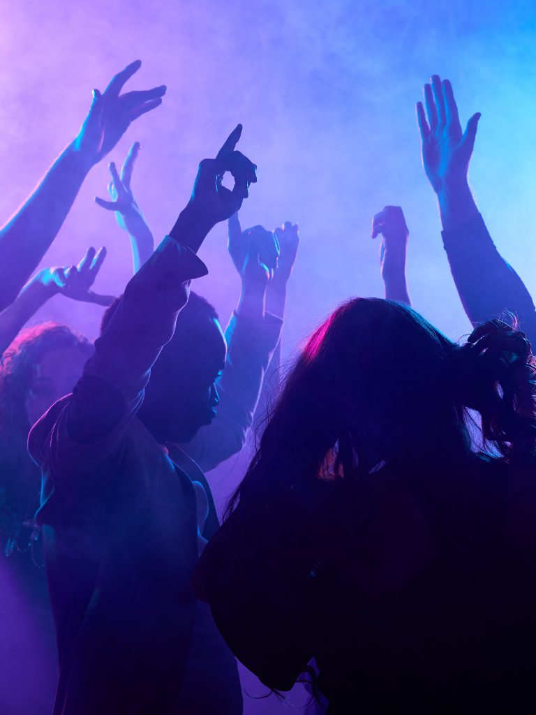 Ravers dancing together